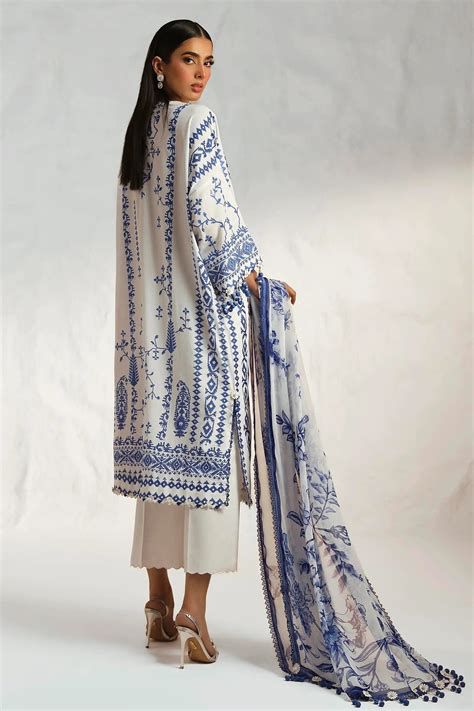White & Blue Printed Lawn Suit with Tassel Details