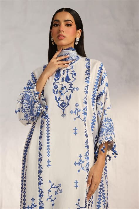 White & Blue Printed Lawn Suit with Tassel Details